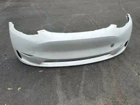 1493736-s0-c Tesla Model Y Front Bumper Without Parktronic Good 1099