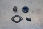 1986 Suzuki RM125 Power Valve Retainer 11265-01B00 Used. Price: $40.00.